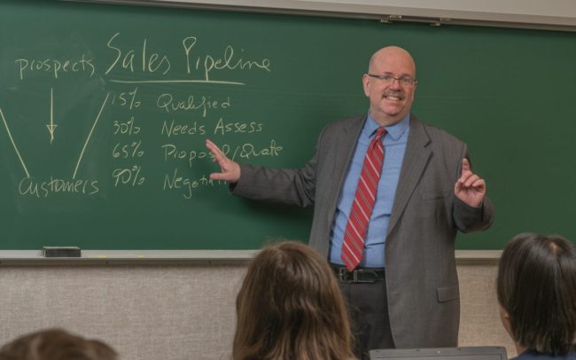 teacher in front of class