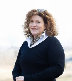 Professional headshot of Maria Lamb.